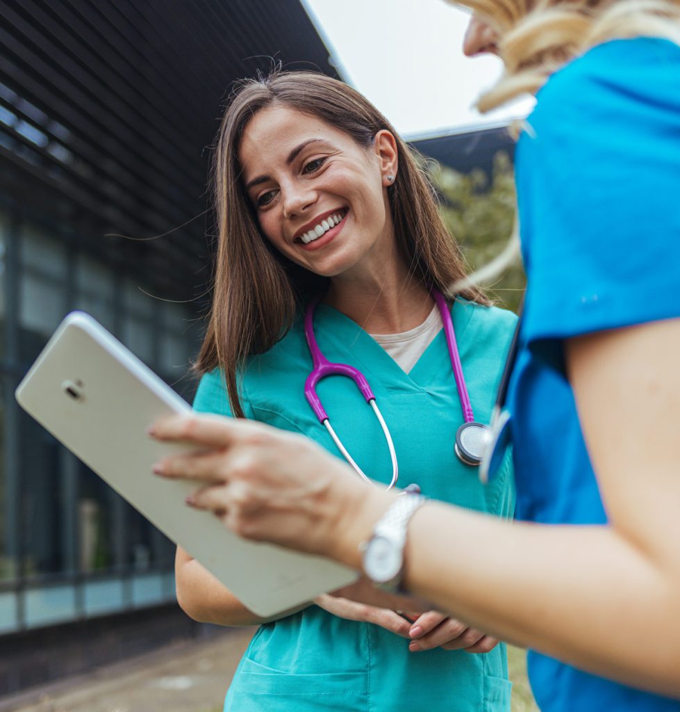 Practitioner discussing notes.